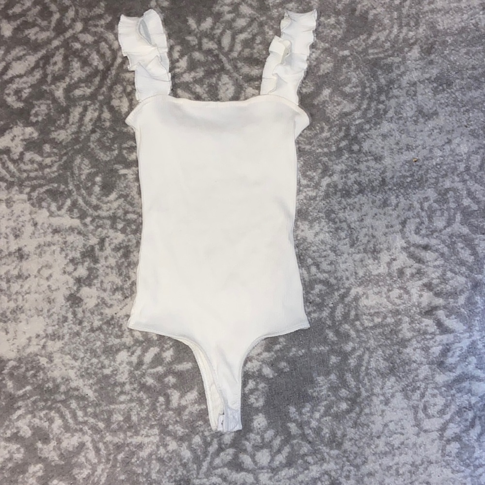 This is a one piece by Charlotte Avery